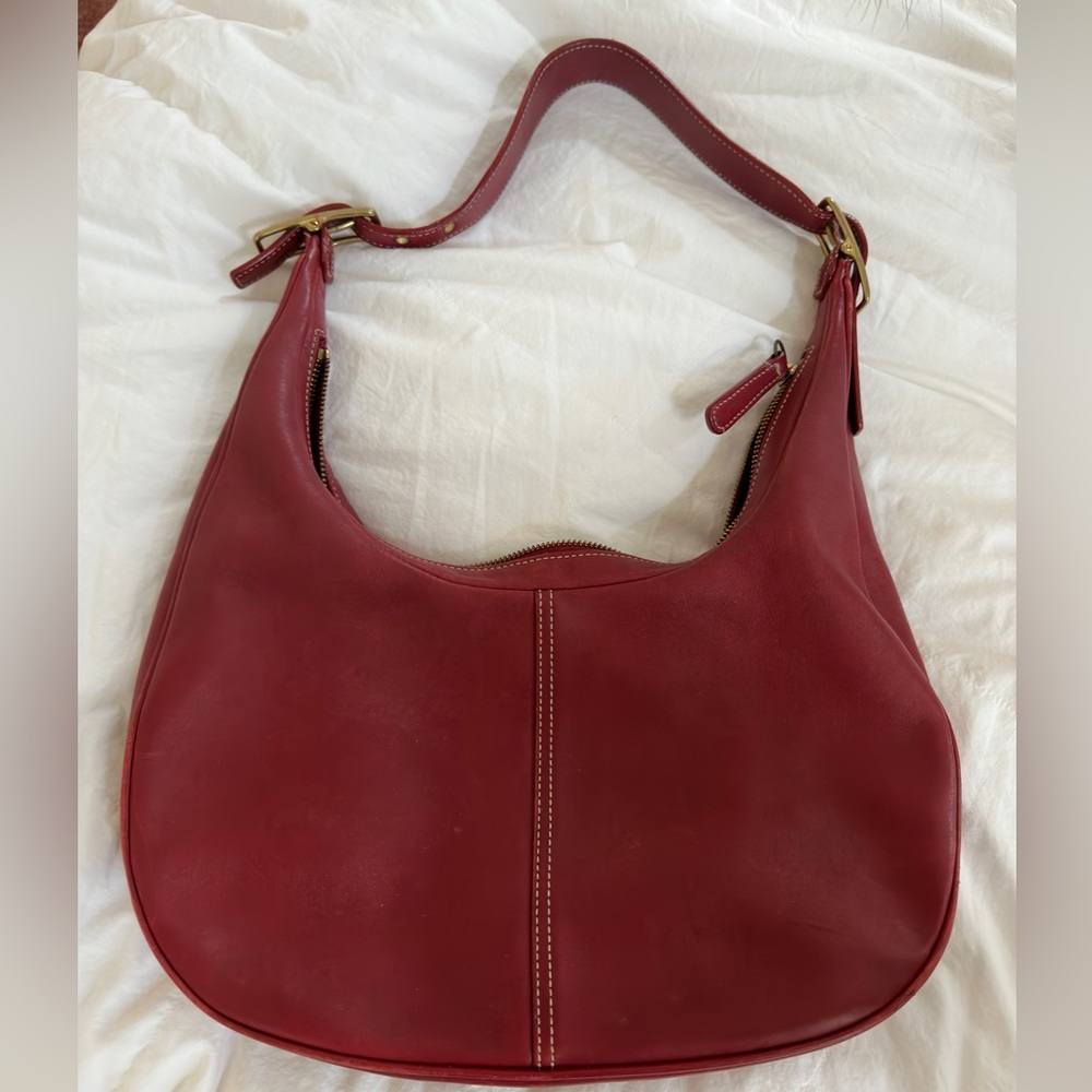 Vintage coach purse, circa 1990. She’s a beauty. In perfect condition.